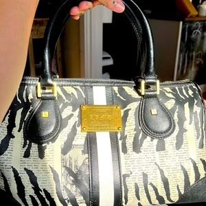 LAMB BY Gwen Steffani est. 2003